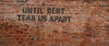 until debt tear us apart writing on the wall 